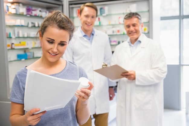 Happy customer holding her medicine