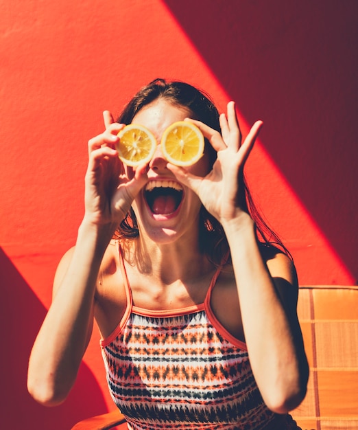 Happy cute girl with oranges