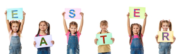 Happy cute kids with colorful letters