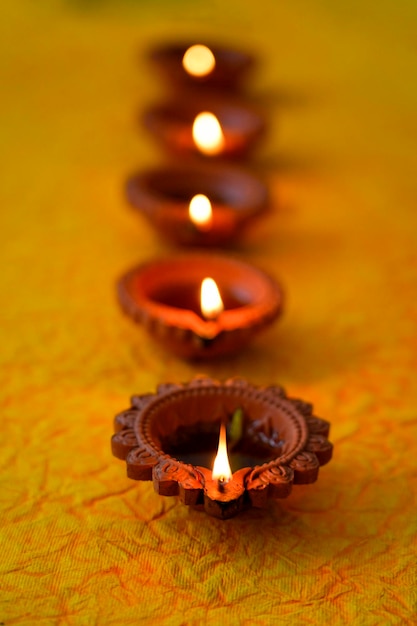 Happy Diwali Diya lamps lit during diwali celebration