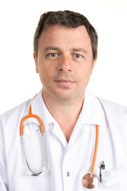 Happy doctor smiling at camera on white background