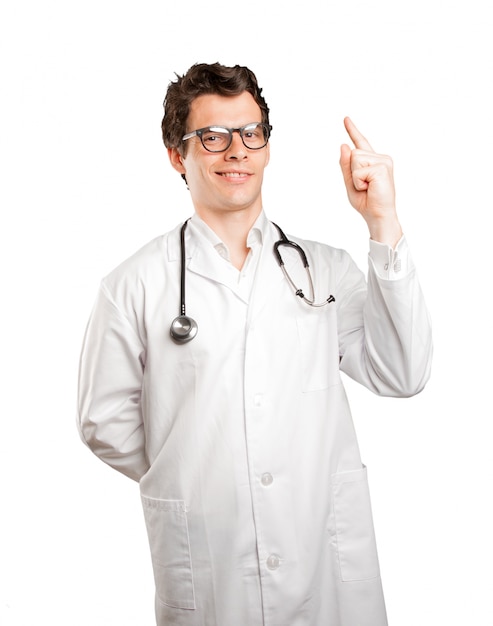 Счастливый врач с жестом номер один на белом фоне