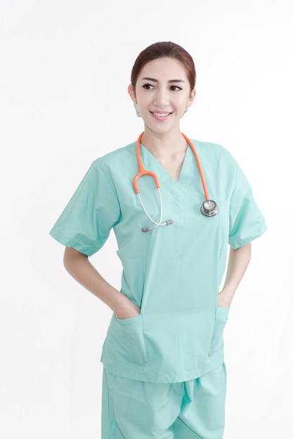 Happy Doctor with a stethoscope standing on white background