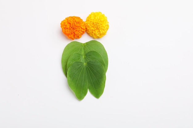 Happy Dussehra greeting card green leaf and marigold flower