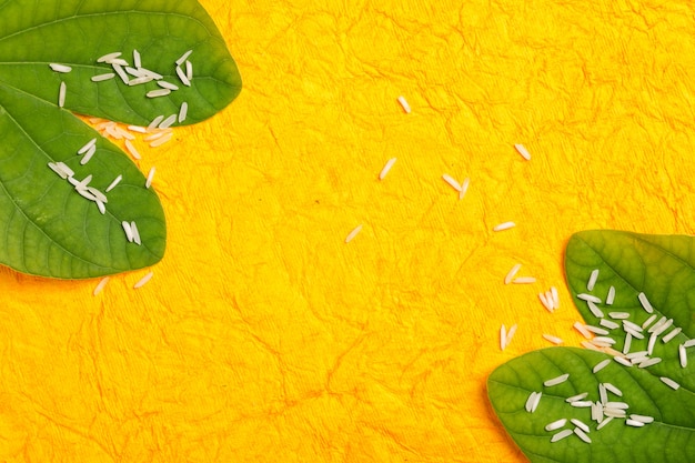 Happy Dussehra greeting card, green leaf and rice