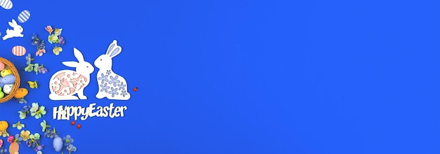Счастливого пасхального баннера на синем фоне с дестивной темой и пасхальным украшением, текстовым сообщением или концепцией поздравительной открытки, копией космического фото