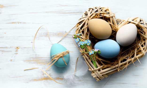 happy easter card. frame with gold and blue speckled easter eggs with copy space for text. isolated on white background