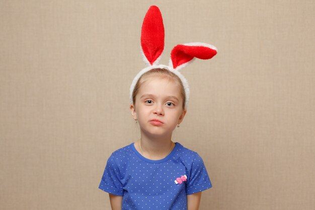 Happy easter. Child girl with bunny ears.