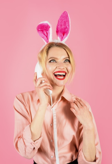 Happy easter coloring egg hunting eggs communication girl with bunny ears talking on landline phone