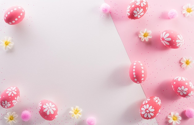 Happy easter decoration concept Colourful Easter eggs with flowers on pink and white background