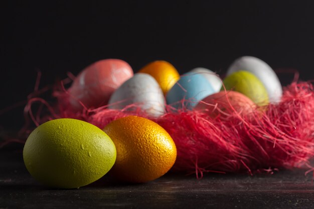 Happy easter! Easter eggs on wood