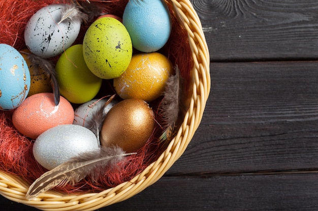 Happy easter! easter eggs on wooden background