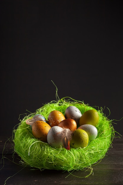 Happy easter! Easter eggs on wooden background