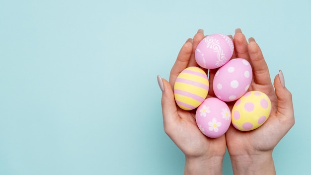 Happy easter festive symbol pastel color egg hands