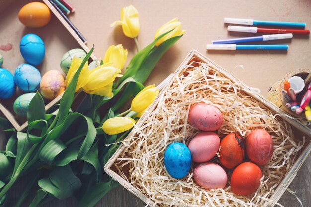 Happy Easter Paints felttip pens flowers decorations for coloring eggs for holiday easter