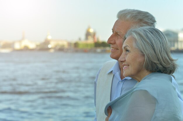 Happy elderly couple on beach