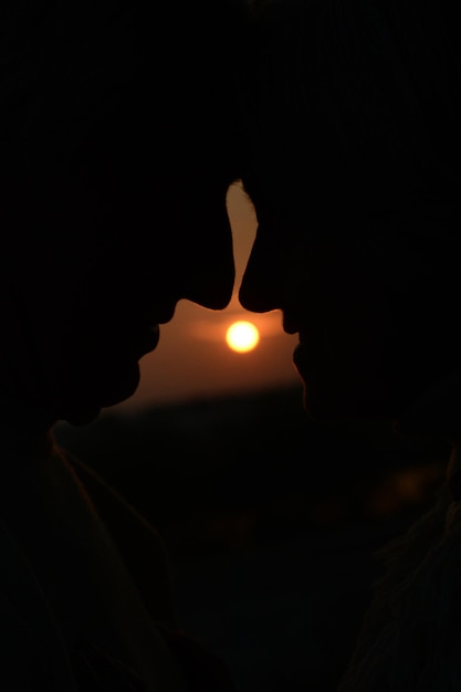 Happy elderly couple at beautiful sunset