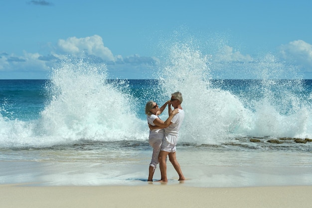 Happy elderly couple dancing