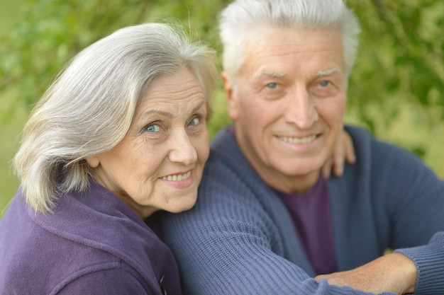 Happy elderly couple embracing