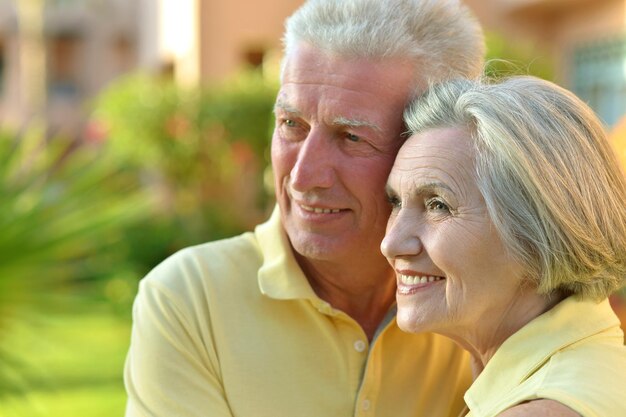 Happy elderly couple embracing