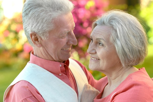 Happy elderly couple embracing