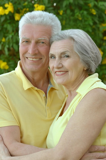 Happy elderly couple embracing