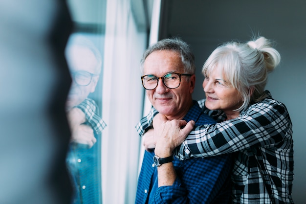 Happy elderly couple in retirement home