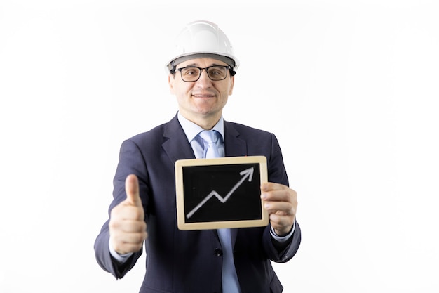 Happy engineer holds sign with up arrow rising oil quotes and showing like sign