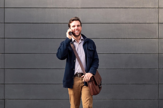 Happy entrepreneur caucasian man talking by phone