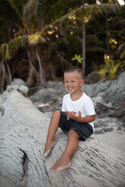 Happy european blond boy in nature