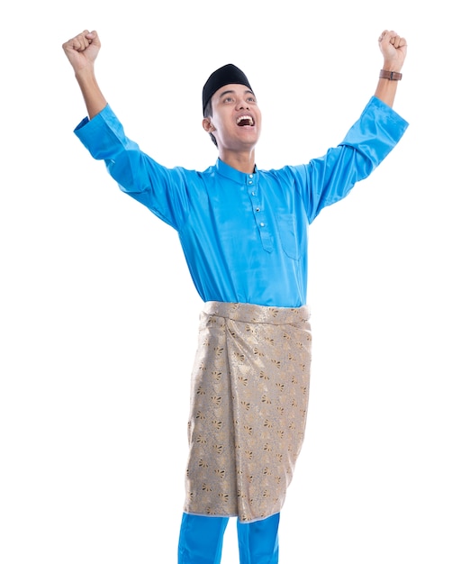 Happy excited malaysian man raising his hands