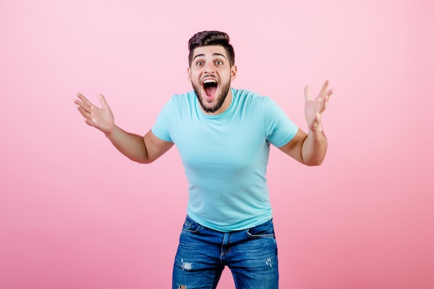 Happy excited smiling young man