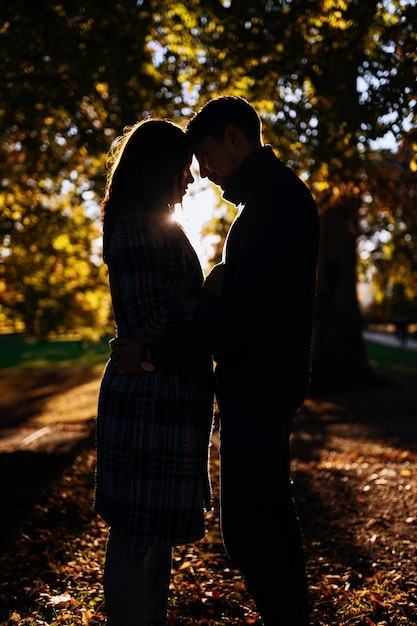 Happy family in autumn park outdoor recreation