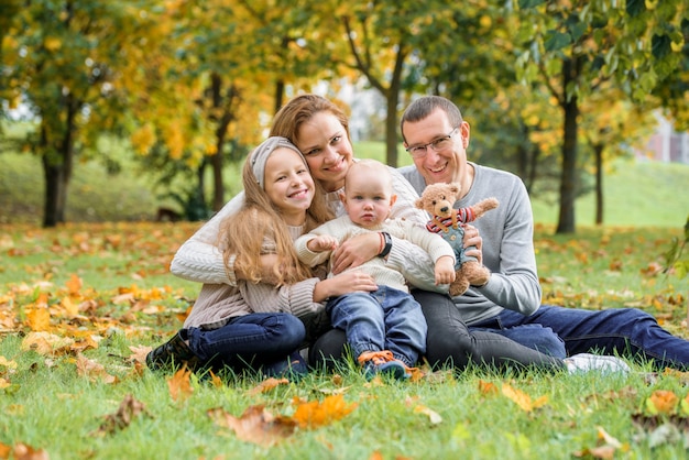 Happy family in an autumn park