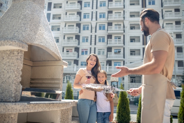 Happy family at a barbecue together