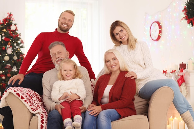 Happy family celebrating Christmas at home