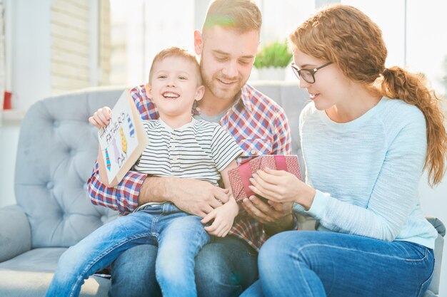 Happy Family Celebrating Fathers Day in Sunlight