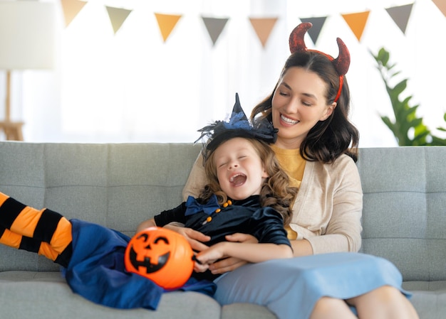 Happy family celebrating Halloween