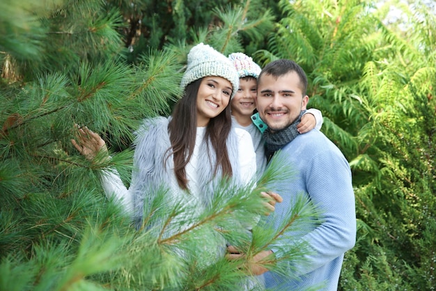 Happy family at Christmas tree market