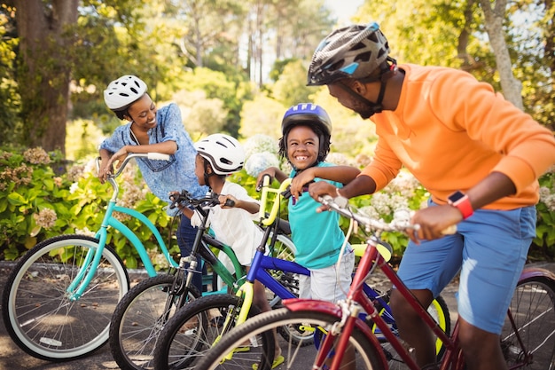 Happy family doing bicycle