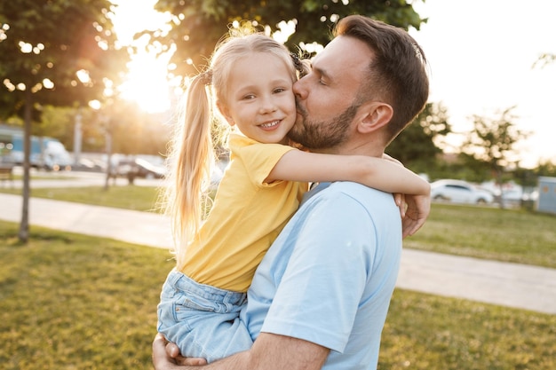 happy family father and daughter in the park