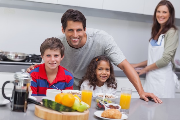 Happy family having breakfast