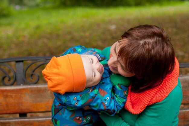 Happy family having fun in autumn park