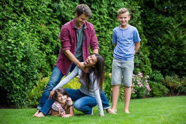 Happy family having fun in park