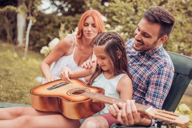 Happy family having fun in the park