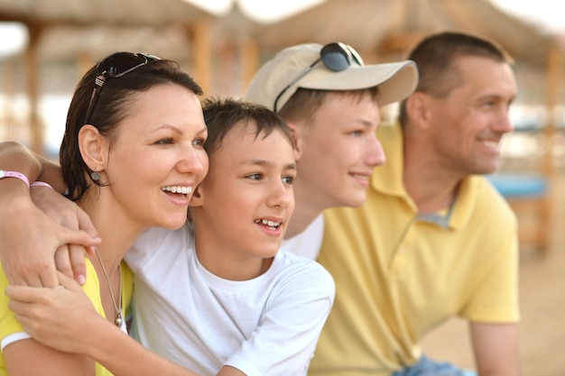 Happy family having fun at tropical resort.