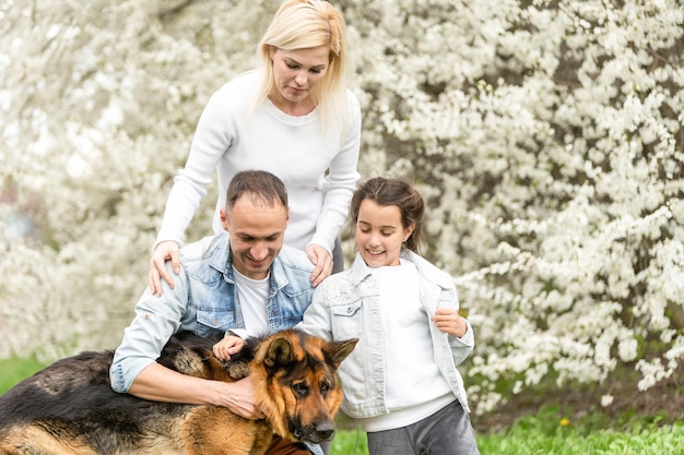 Happy family having picnic in nature. Smiling family picnicking in the park. spring nature