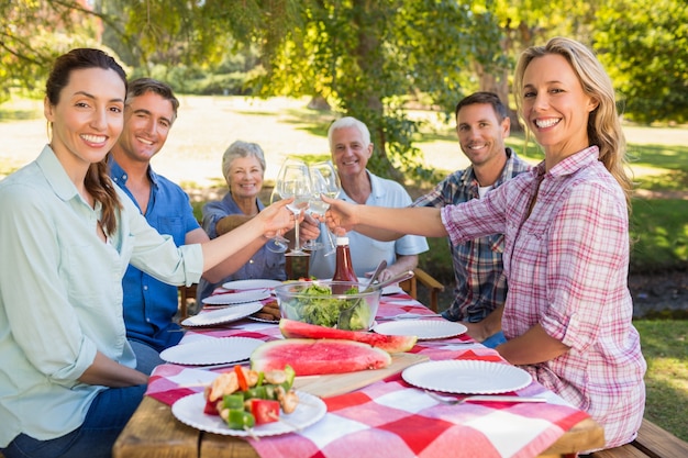 Happy family having picnic in the park 