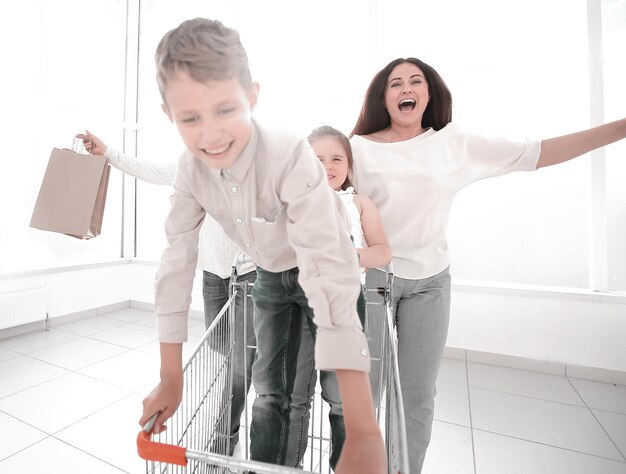 Happy family in a hurry to shop