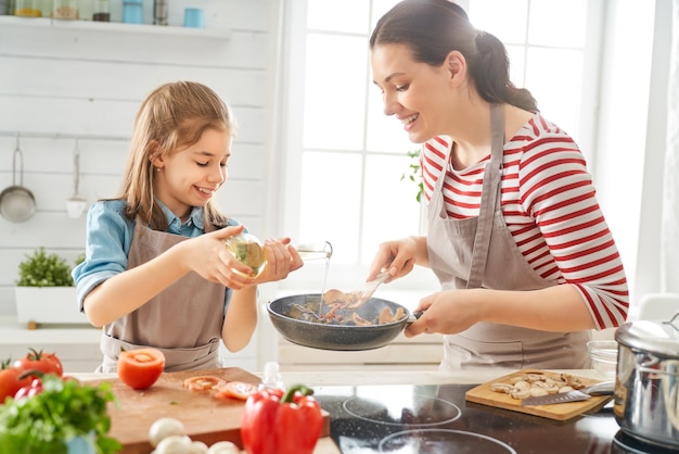 Happy family in the kitchen.